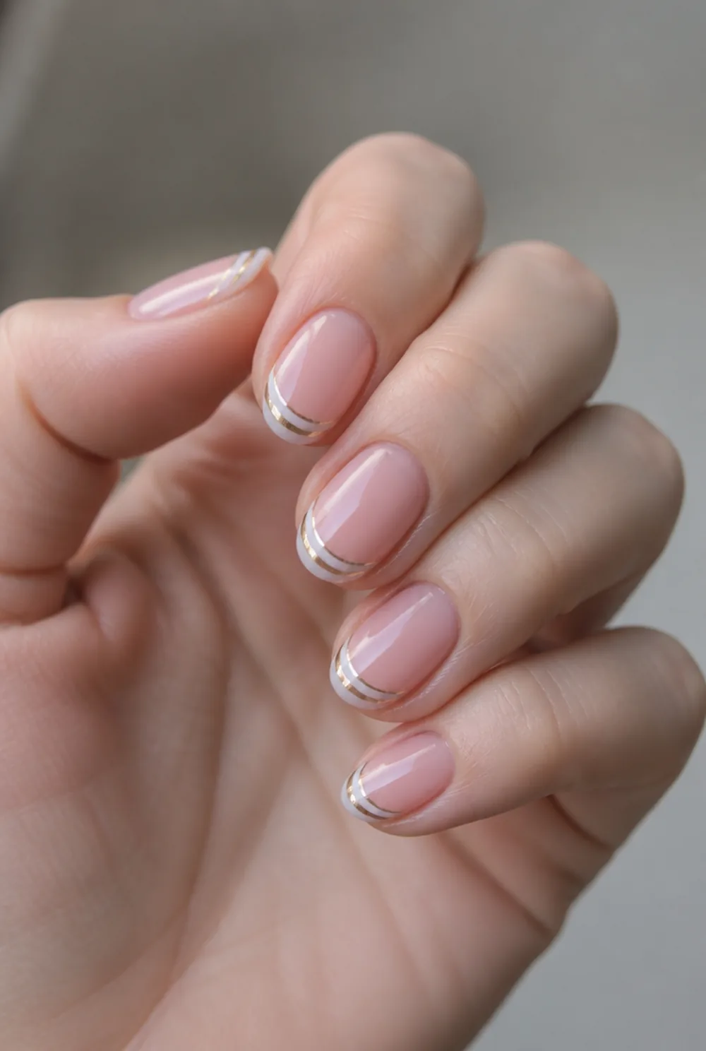 double french lines nail art on fair skin short length - PolishedAndPrettyNails.com double french lines nail art on fair skin, short length