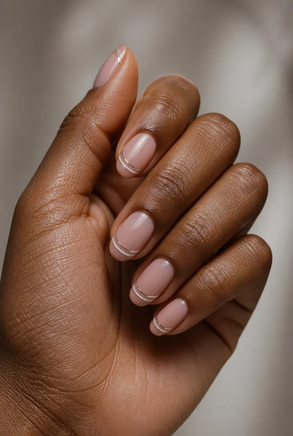 double french lines nail art on deep brown skin - PolishedAndPrettyNails.com double french lines nail art on deep brown skin
