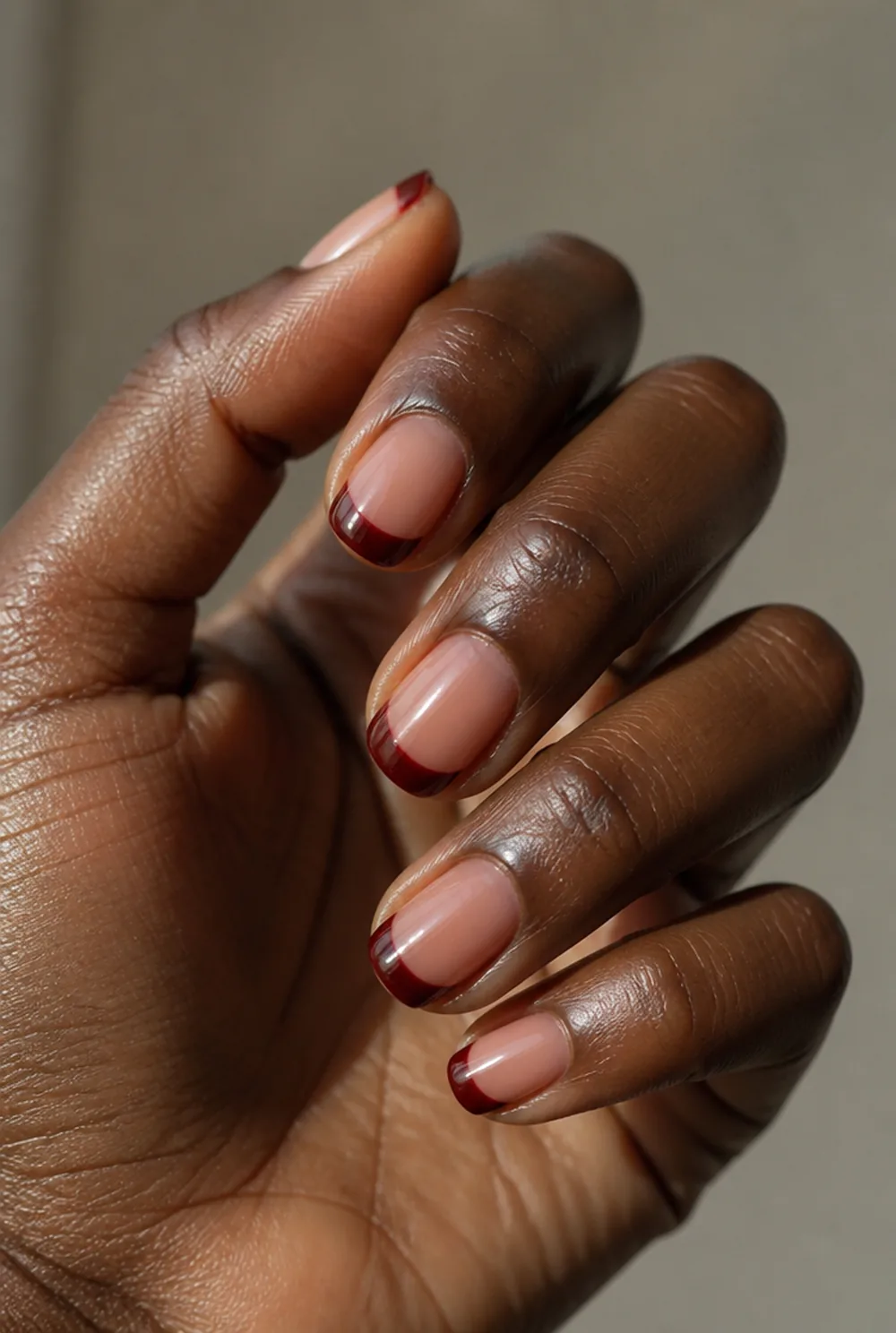 classic red revolution french tip nails nail art on deep brown skin