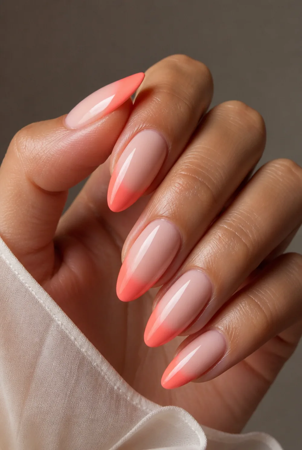 coral sunset french tip nails nail art on olive skin, long length