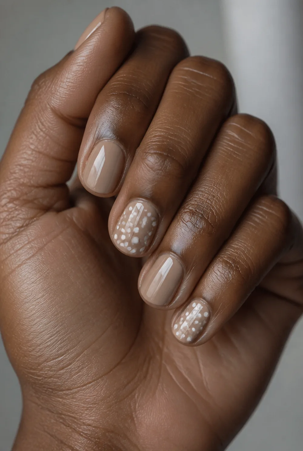 polka dot accent nail art on deep brown skin - PolishedAndPrettyNails.com polka dot accent nail art on deep brown skin