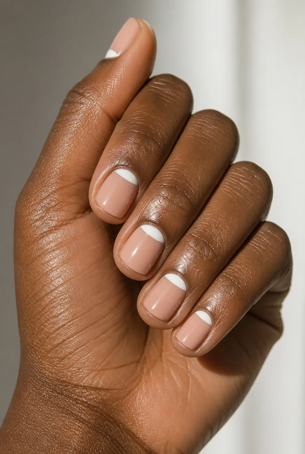half-moon cuticle arcs nail art on deep brown skin - PolishedAndPrettyNails.com half-moon cuticle arcs nail art on deep brown skin