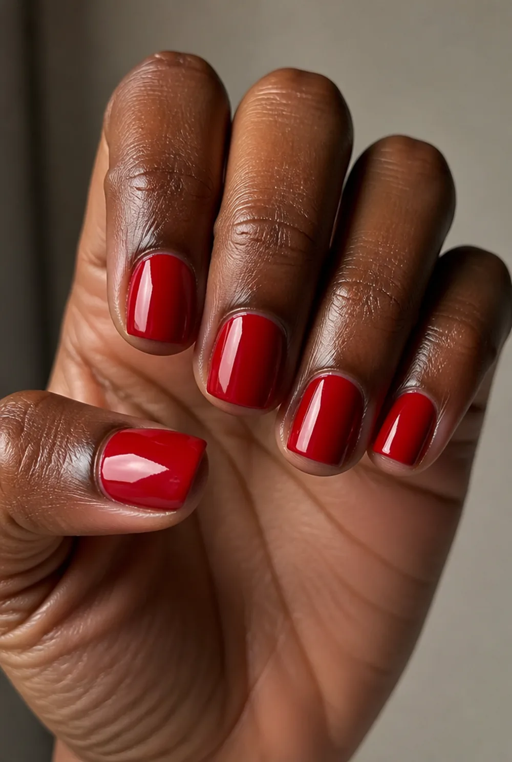 cherry red short square nail art on deep brown skin - PolishedAndPrettyNails.com cherry red short square nail art on deep brown skin