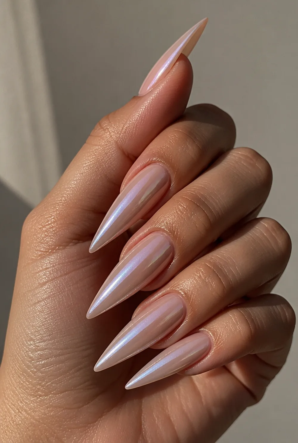 glazed chrome stiletto nail art on olive skin long length - PolishedAndPrettyNails.com glazed chrome stiletto nail art on olive skin, long length