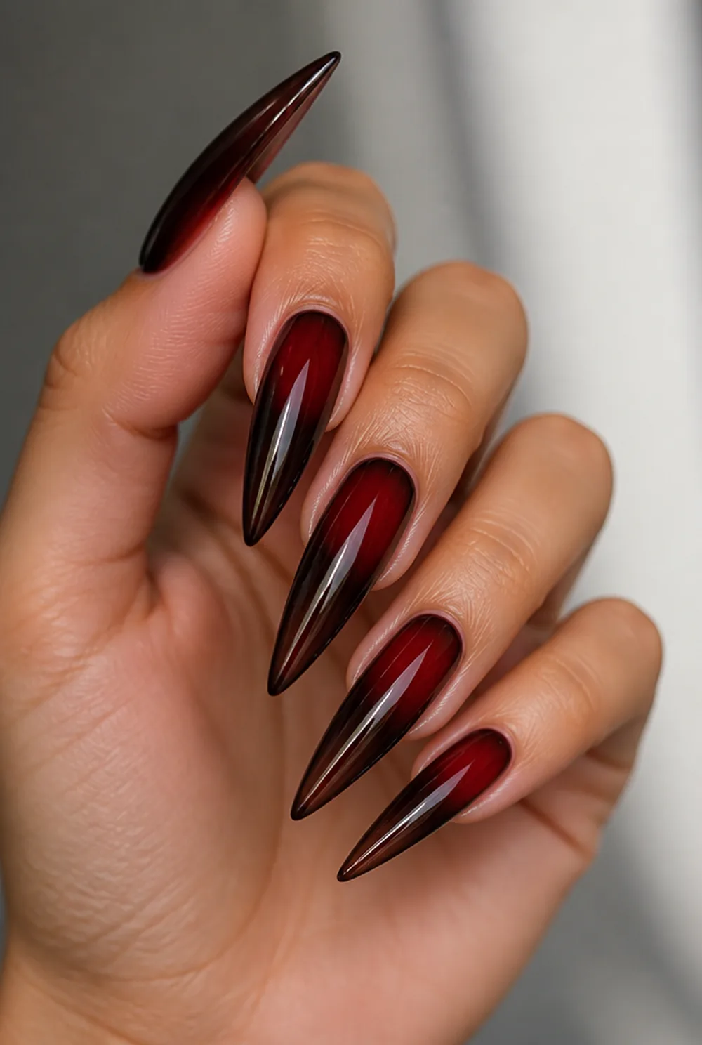 cherry cola stiletto nail art on olive skin long length - PolishedAndPrettyNails.com cherry cola stiletto nail art on olive skin, long length