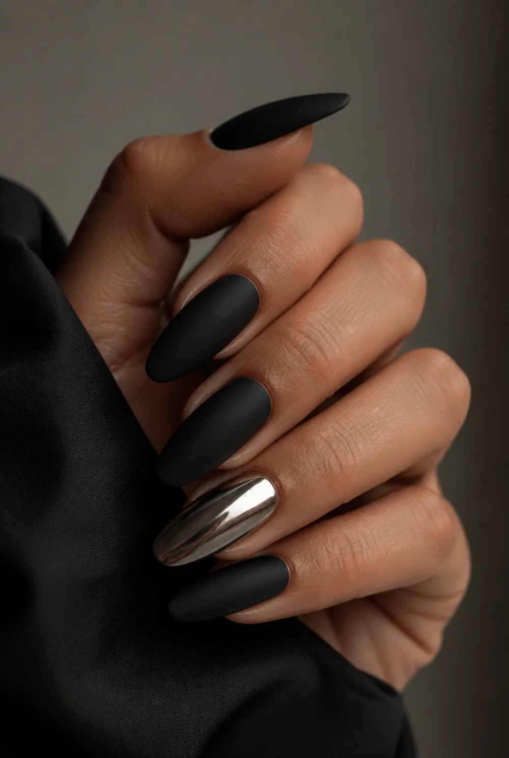 blackout with one chrome accent nail art on olive skin long length - PolishedAndPrettyNails.com blackout with one chrome accent nail art on olive skin, long length
