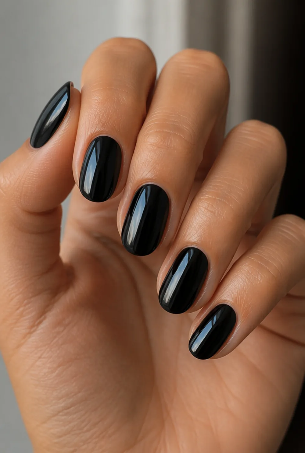 glass-black gloss nail art on olive skin, long length