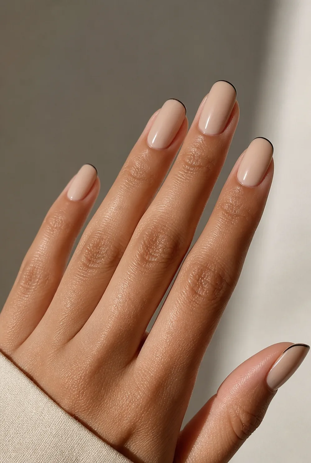 black micro french nail art on olive skin, long length