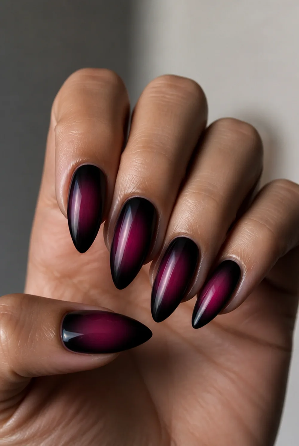 black aura nail art on olive skin, long length
