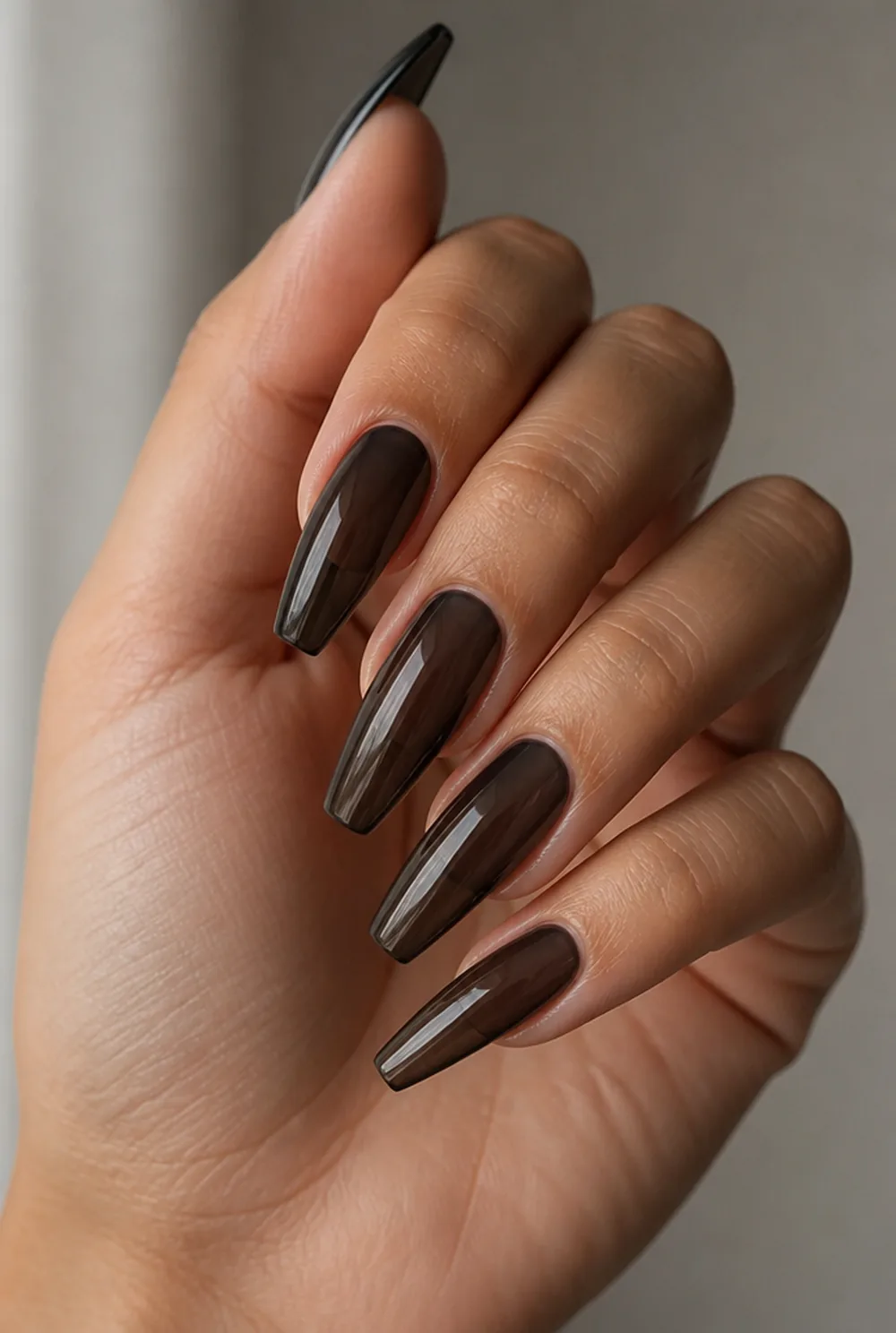 black jelly nail art on olive skin, long length