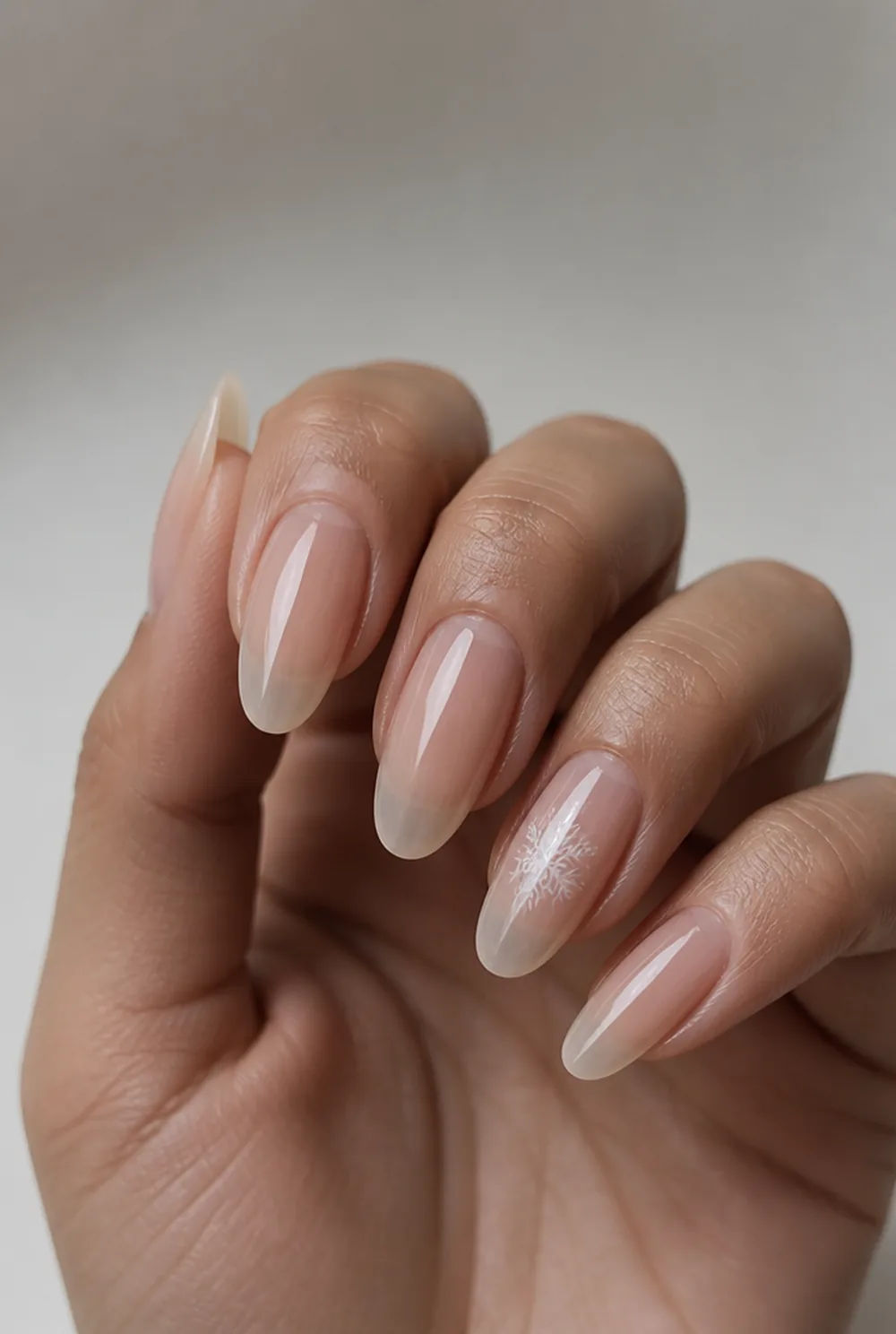 single snowflake accent nail art on olive skin long length - PolishedAndPrettyNails.com single snowflake accent nail art on olive skin, long length