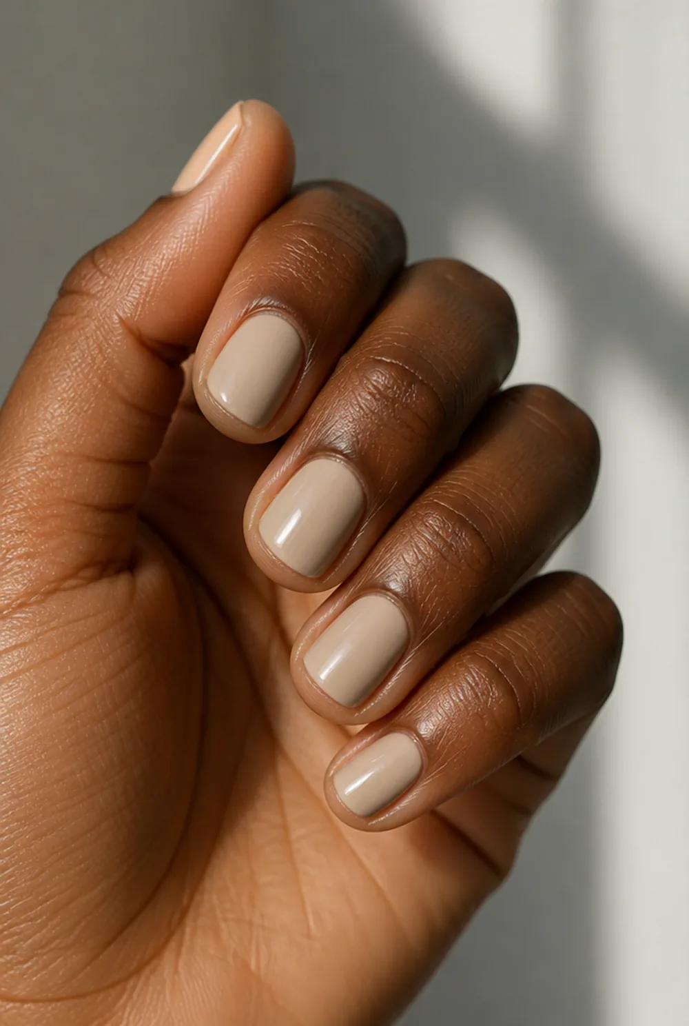 oat milk square nail art on deep brown skin