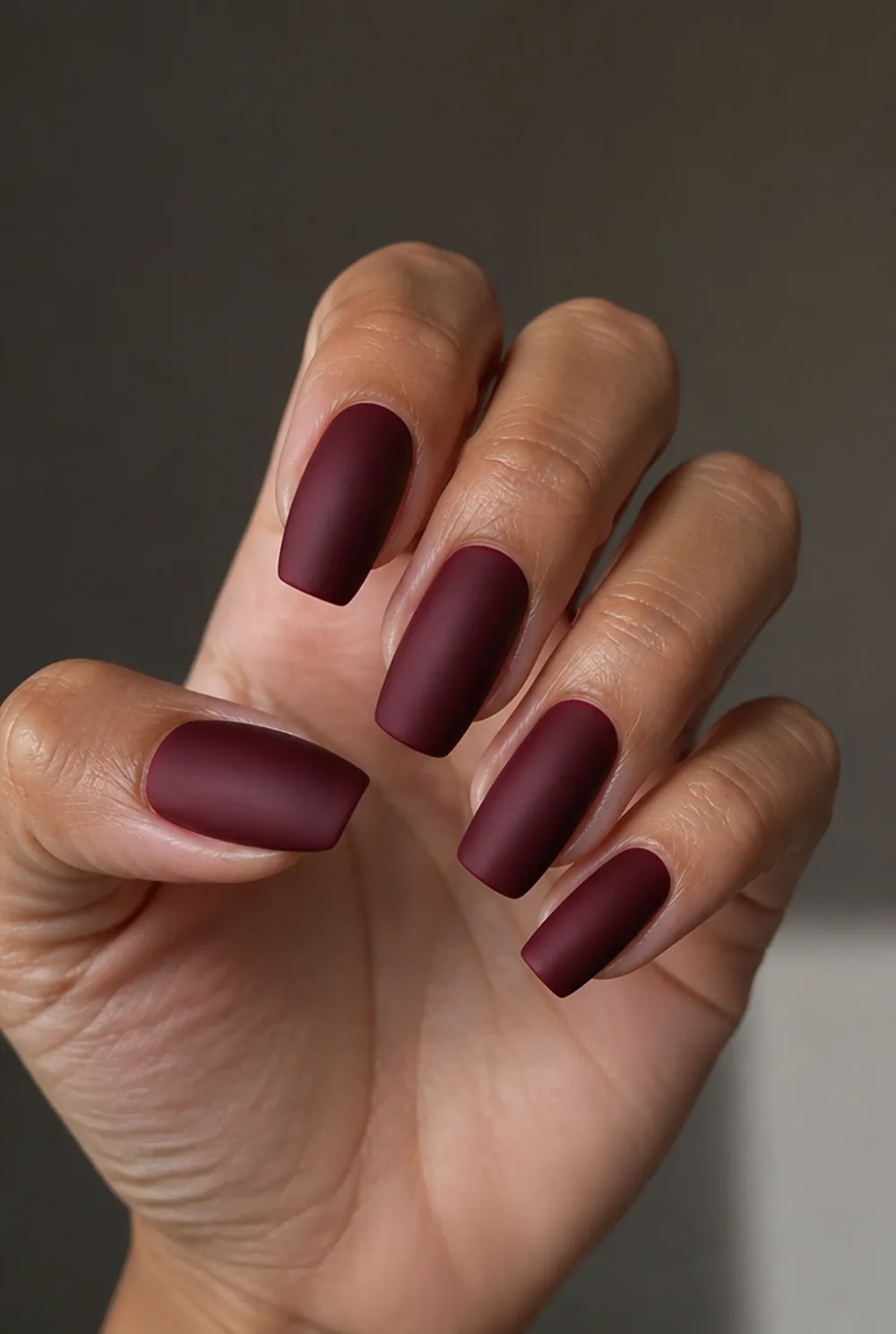 short wine solids nail art on olive skin, long length