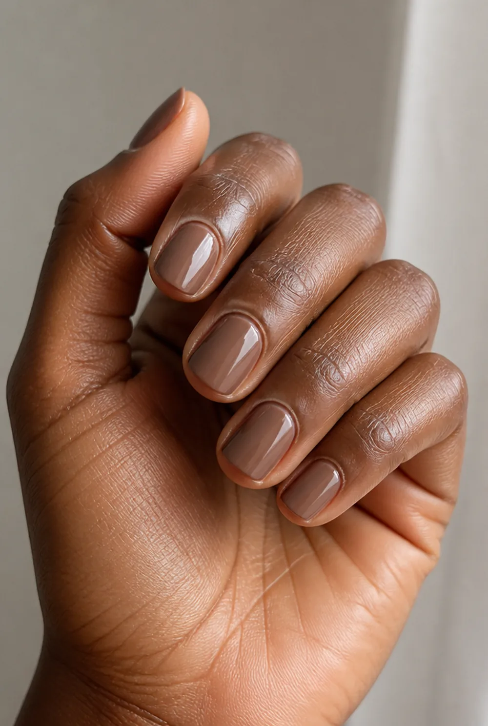 latte shorties nail art on deep brown skin