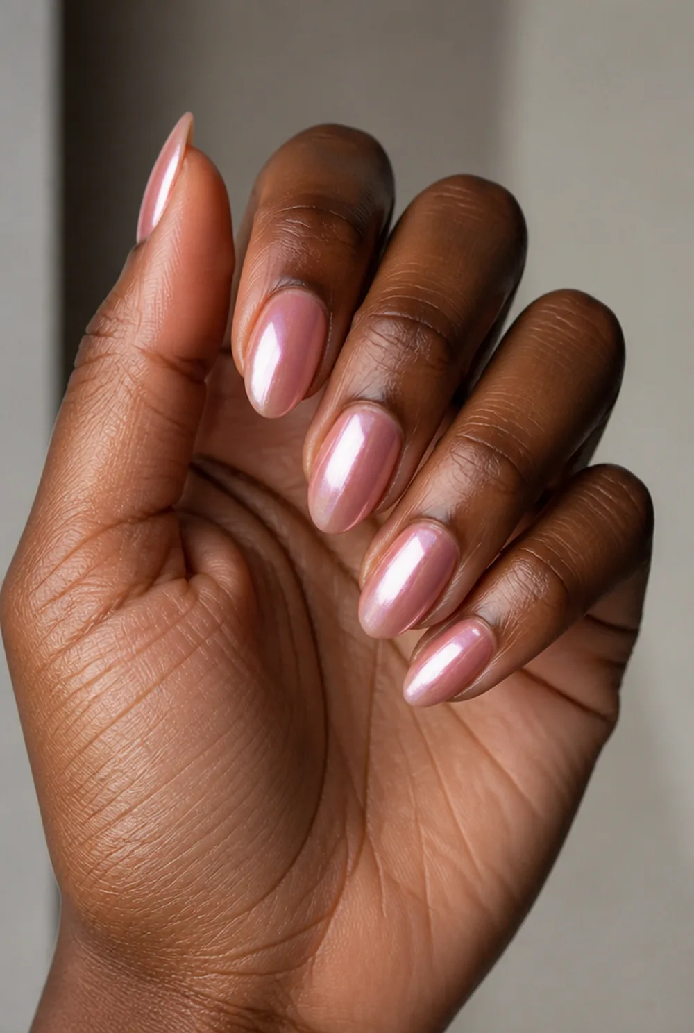 sheer rose glaze nail art on deep brown skin