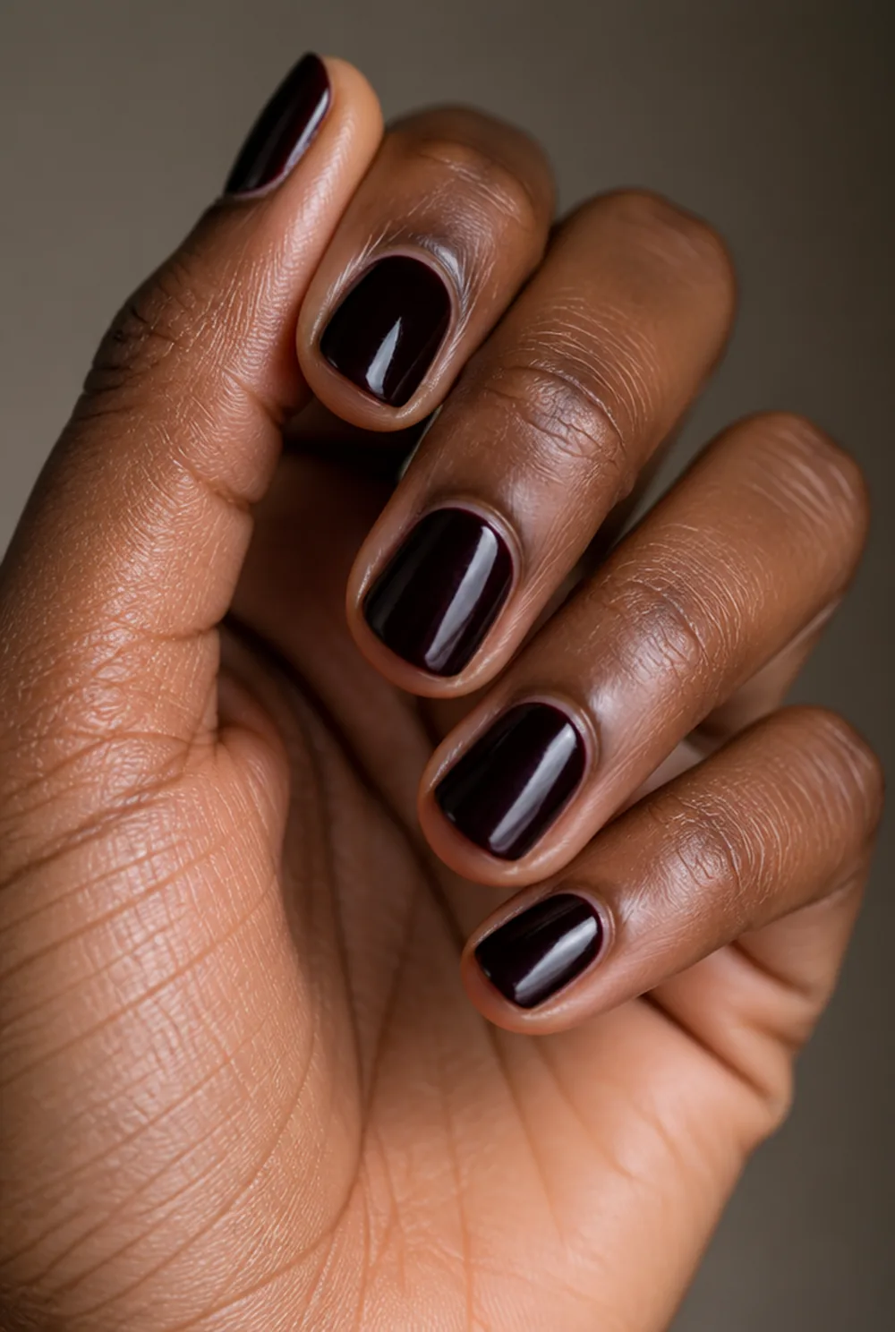 dark cherry / black cherry nail art on deep brown skin