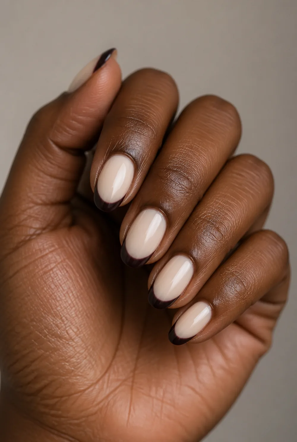 midnight plum french nail art on deep brown skin