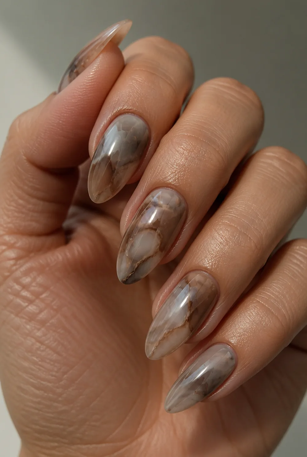 smoky quartz marble nail art on olive skin, long length