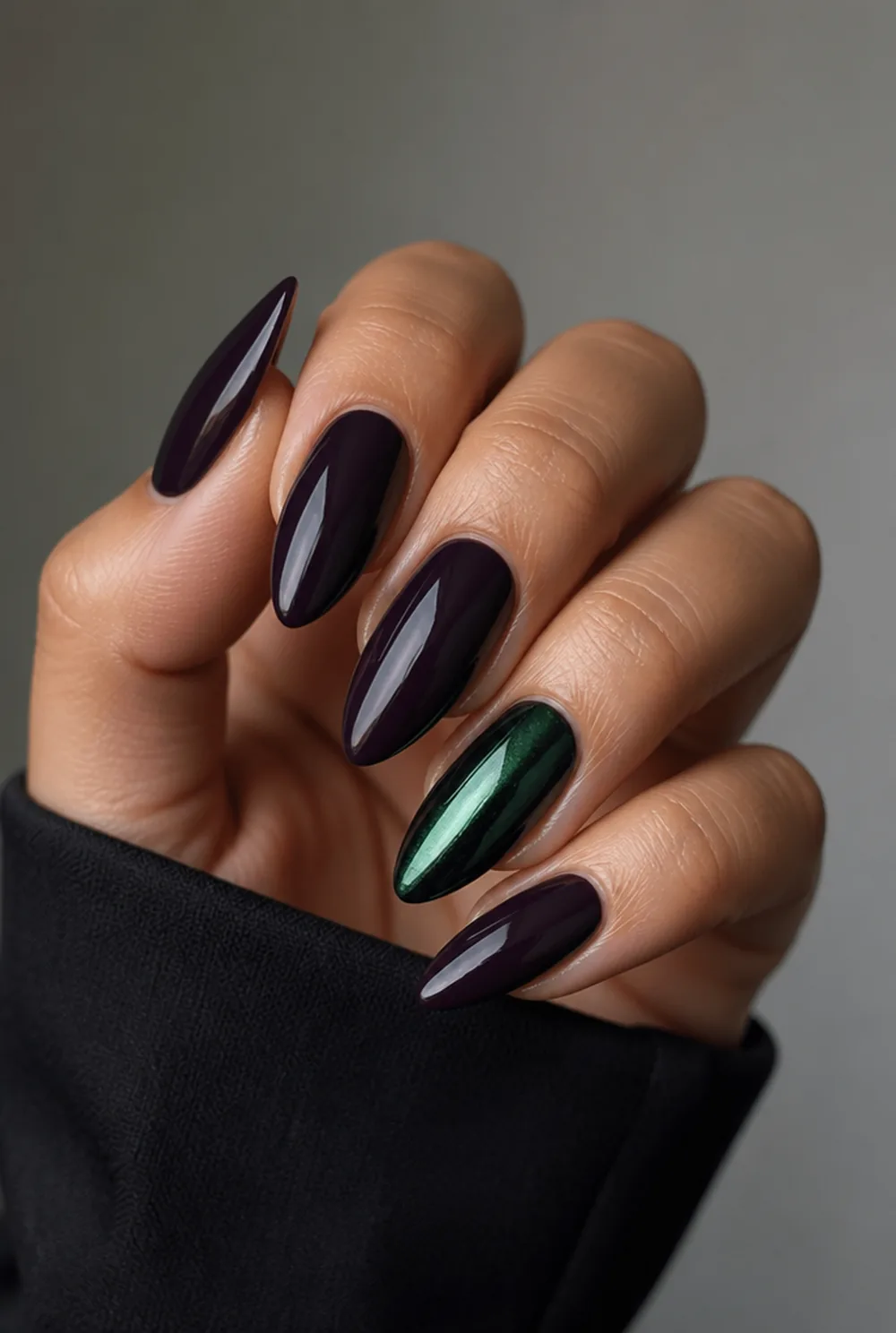maleficent purple-green nail art on olive skin, long length