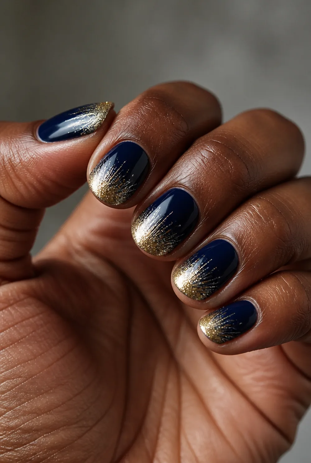 fireworks finale nail art on deep brown skin