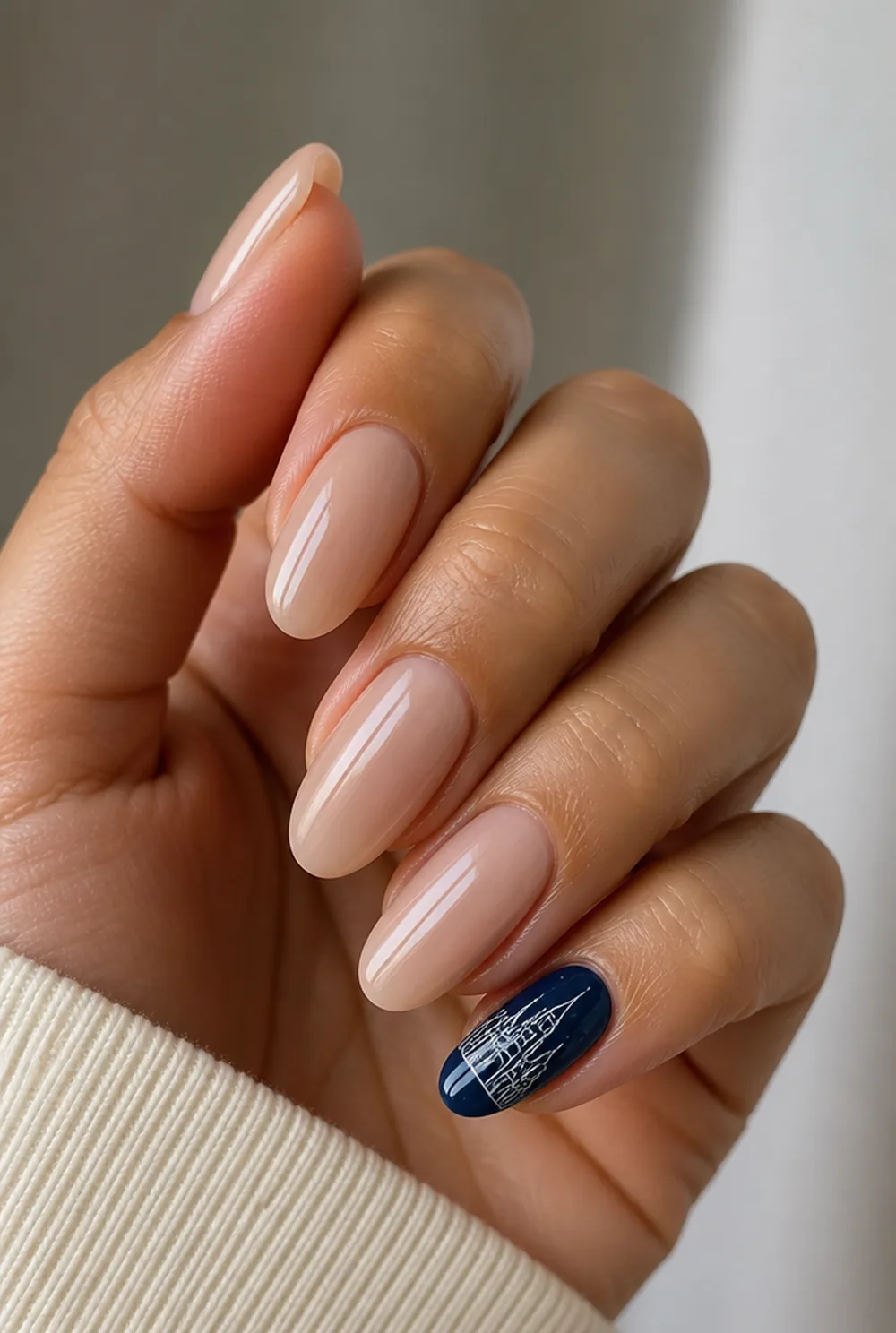 castle silhouette pinky nail art on olive skin, long length