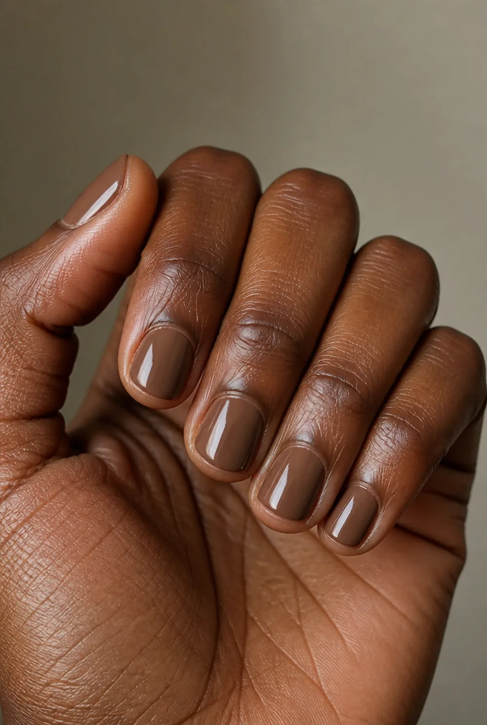 chocolate cream nail art on deep brown skin