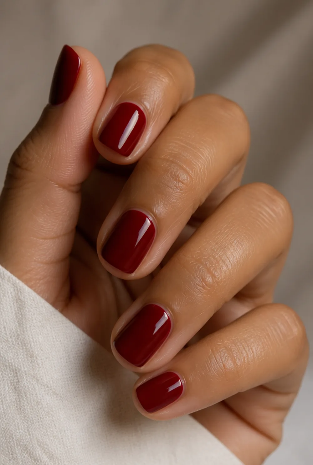 deep red power move nail art on olive skin, long length