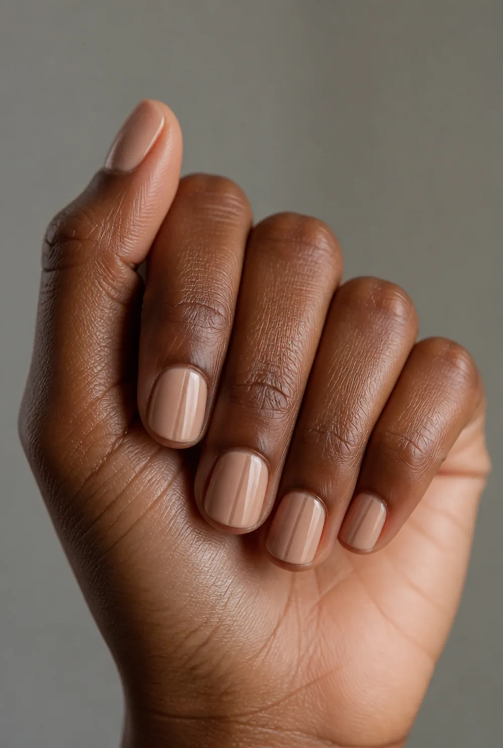 tone-on-tone stripe nail art on deep brown skin
