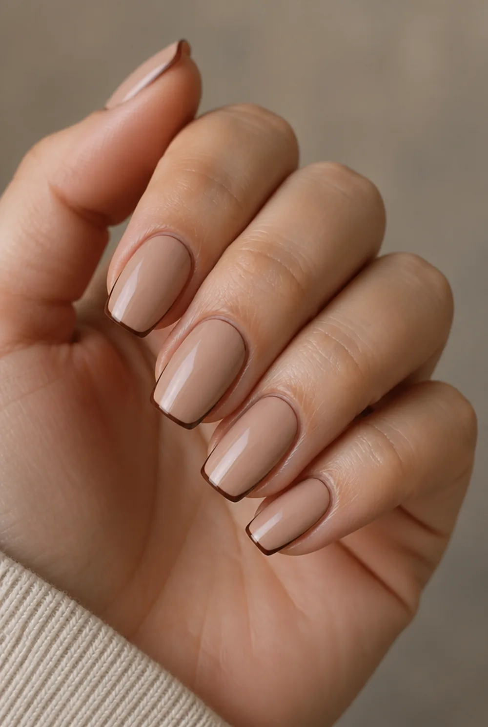 espresso border nails nail art on fair skin, short length