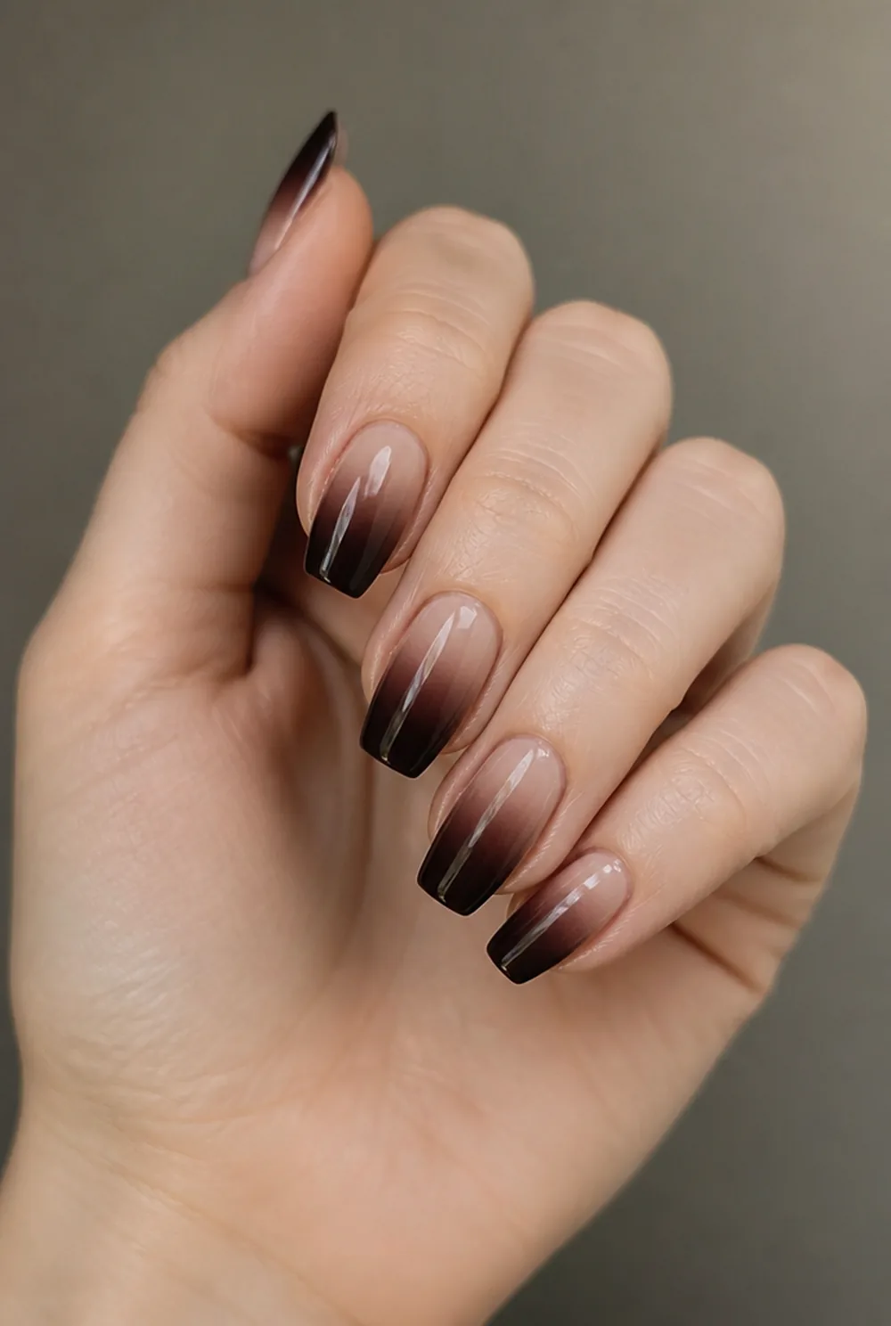 espresso ombre coffin nail art on fair skin, short length