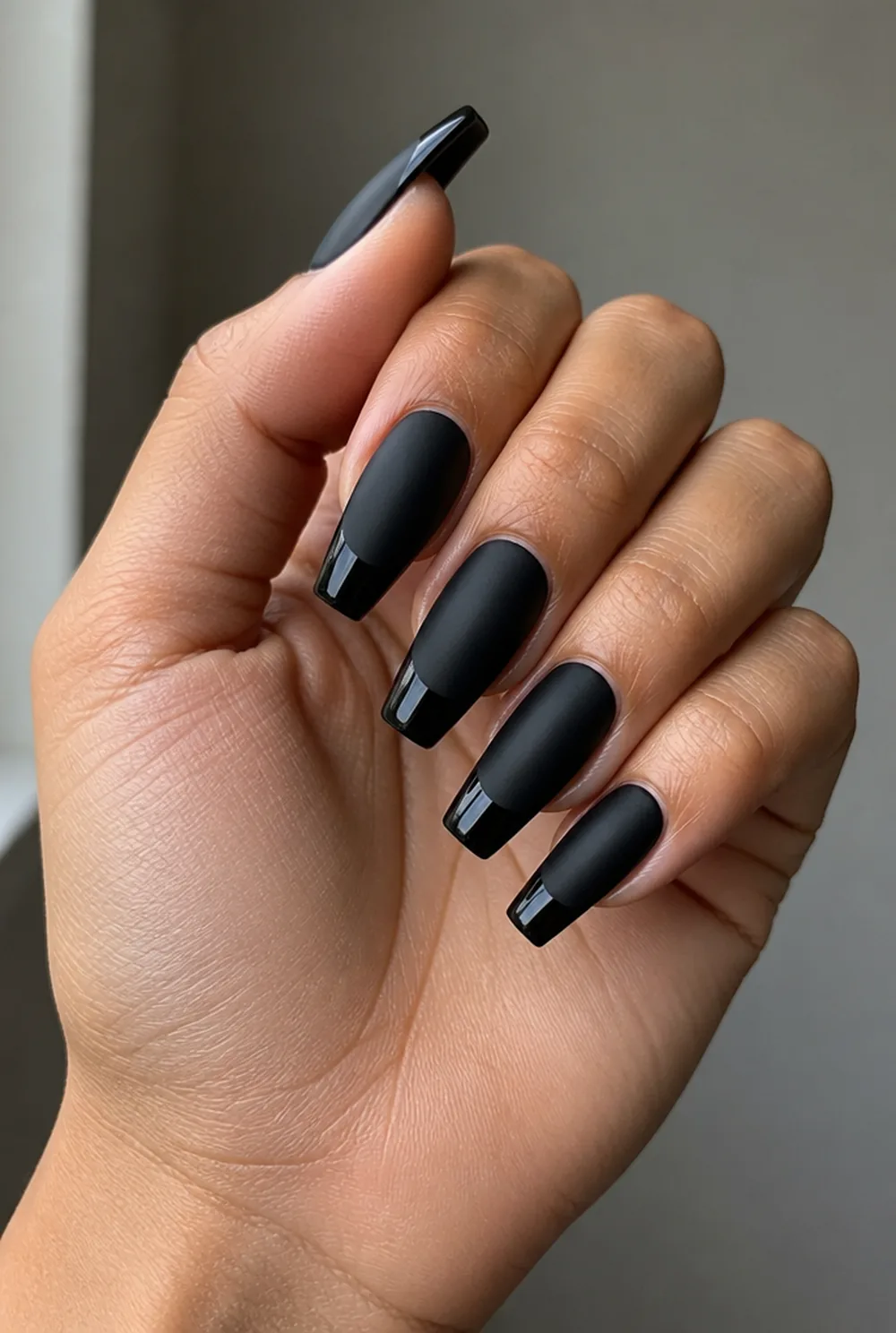 matte black with glossy tips nail art on olive skin, long length