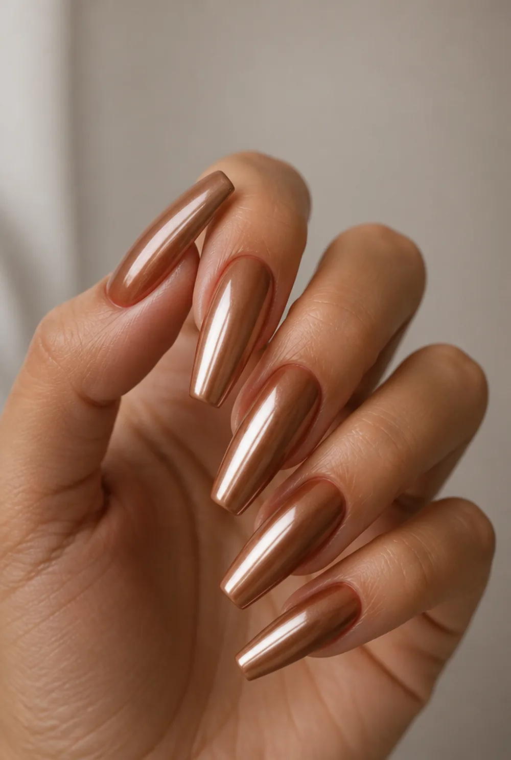 cinnamon glaze coffin nail art on olive skin, long length