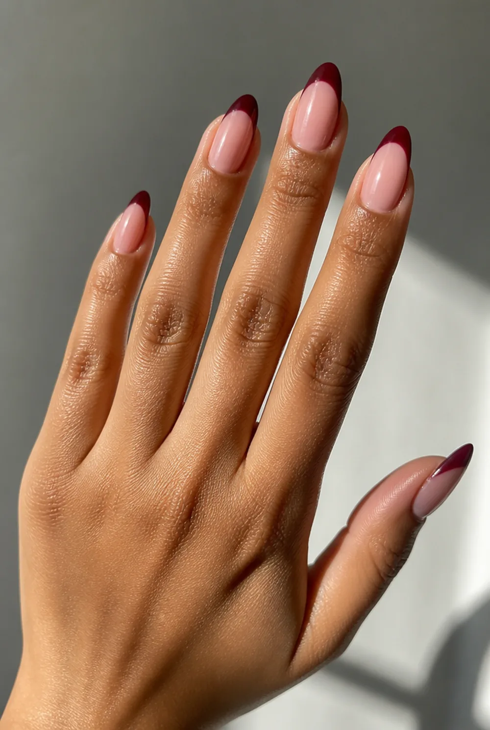 classic burgundy tips nail art on olive skin, long length