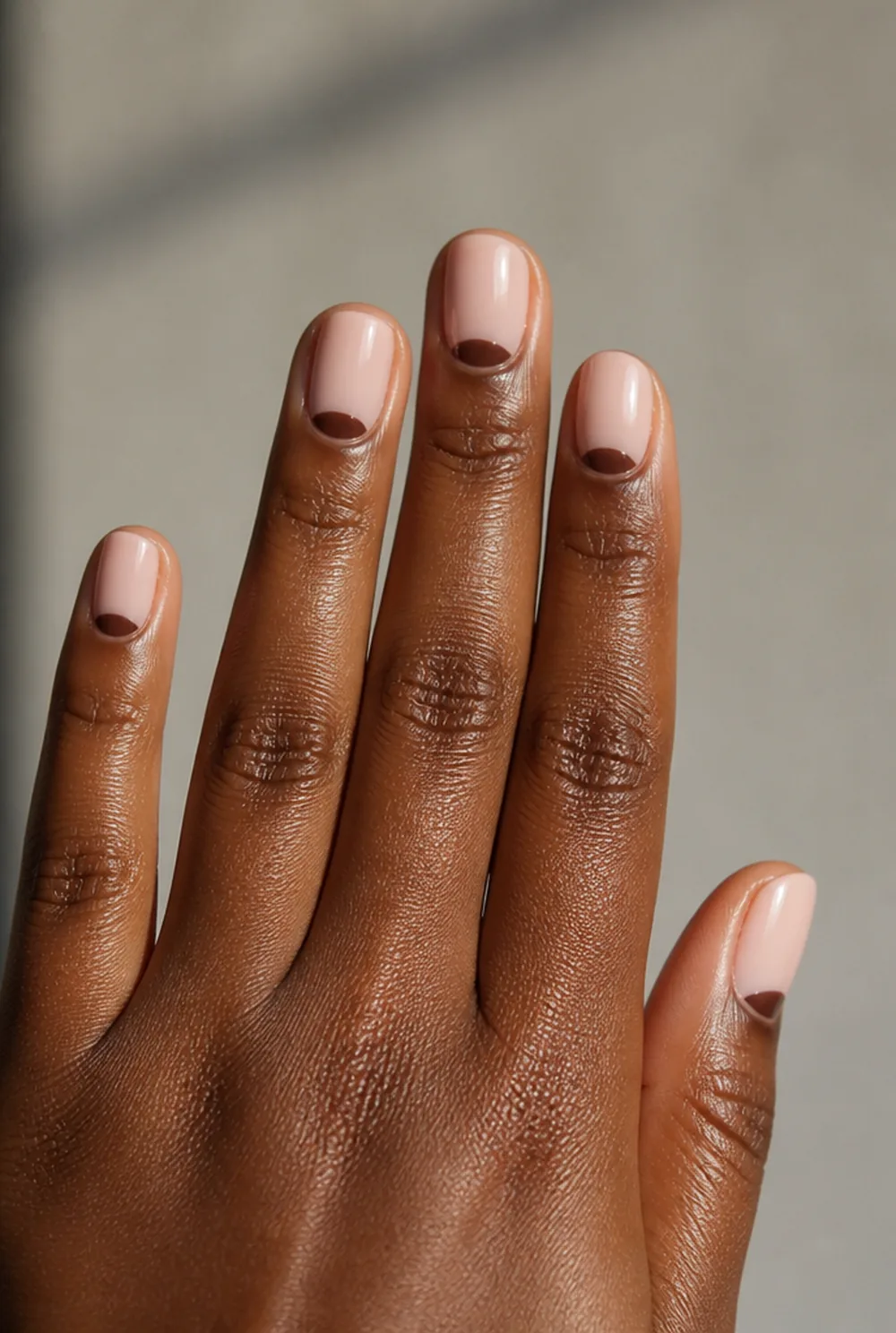 espresso reverse french nail art on deep brown skin