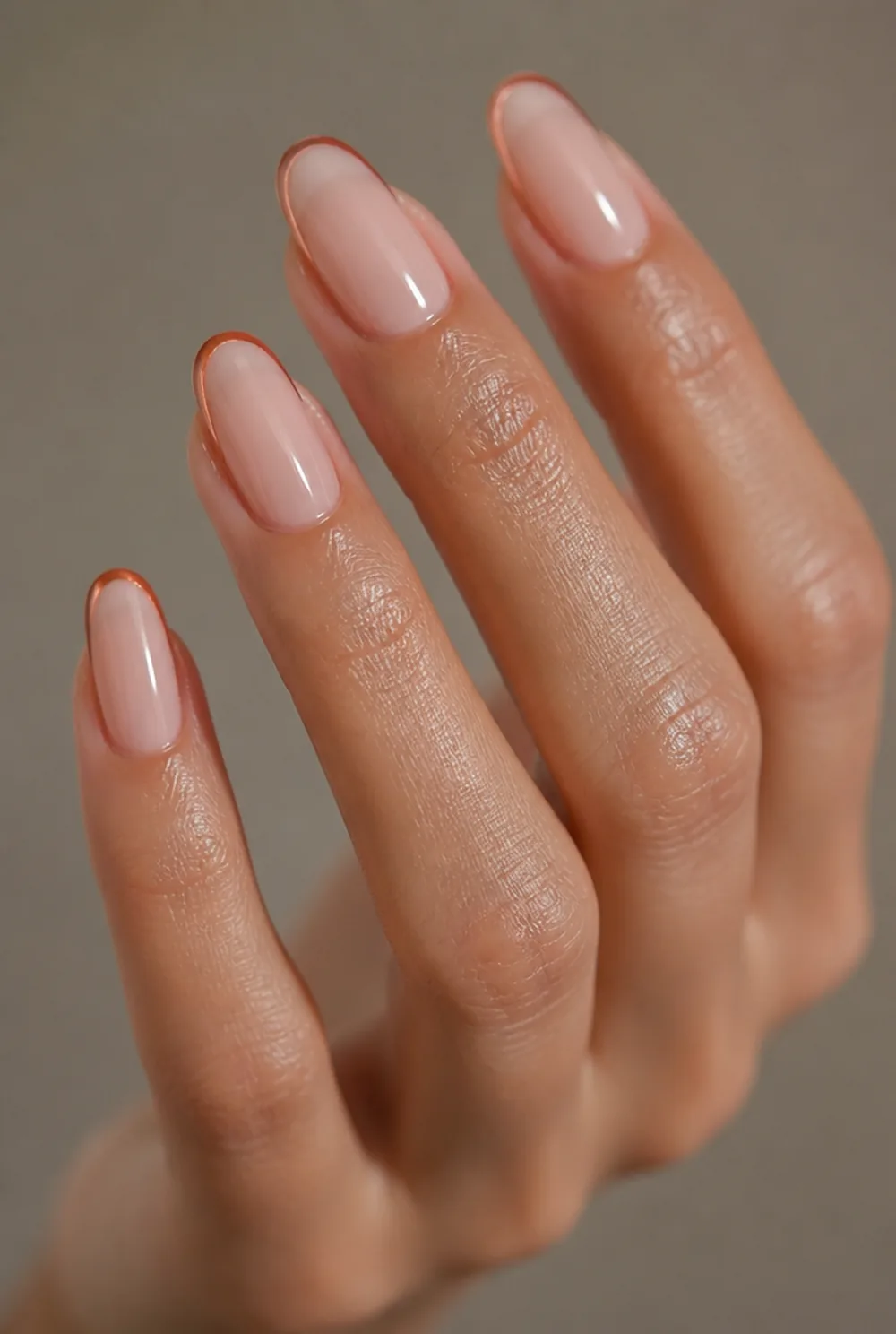 rust micro-french on short nails nail art on olive skin, long length
