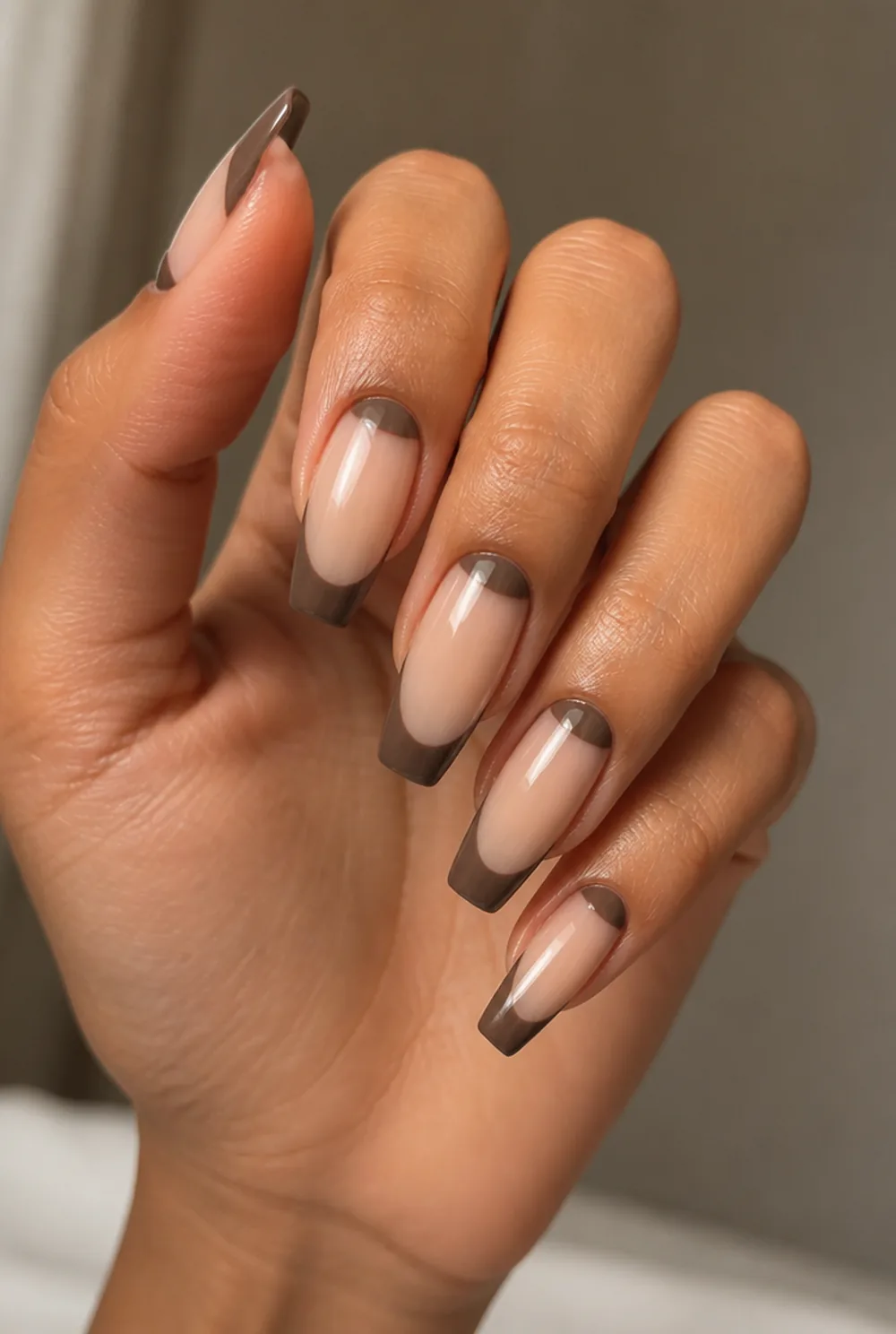 mocha half-moon and tip combo nail art on olive skin, long length