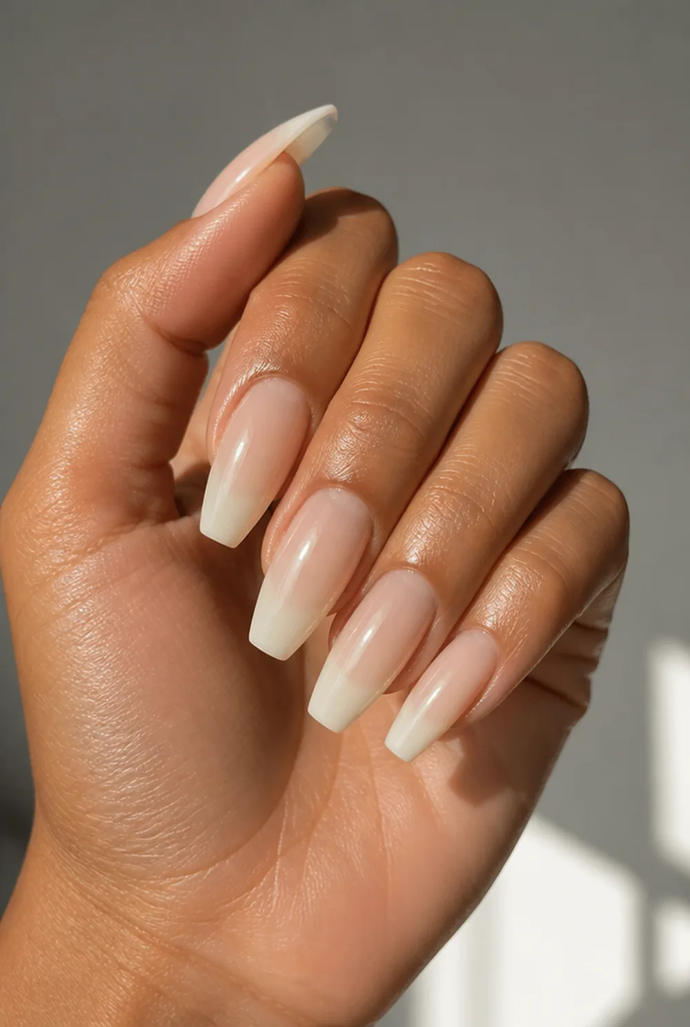 milky beige latte nails nail art on olive skin, long length
