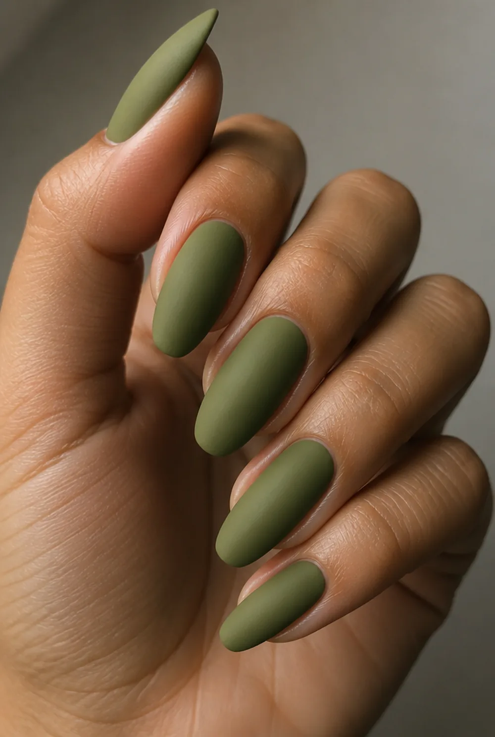 olive green creme nail art on olive skin, long length