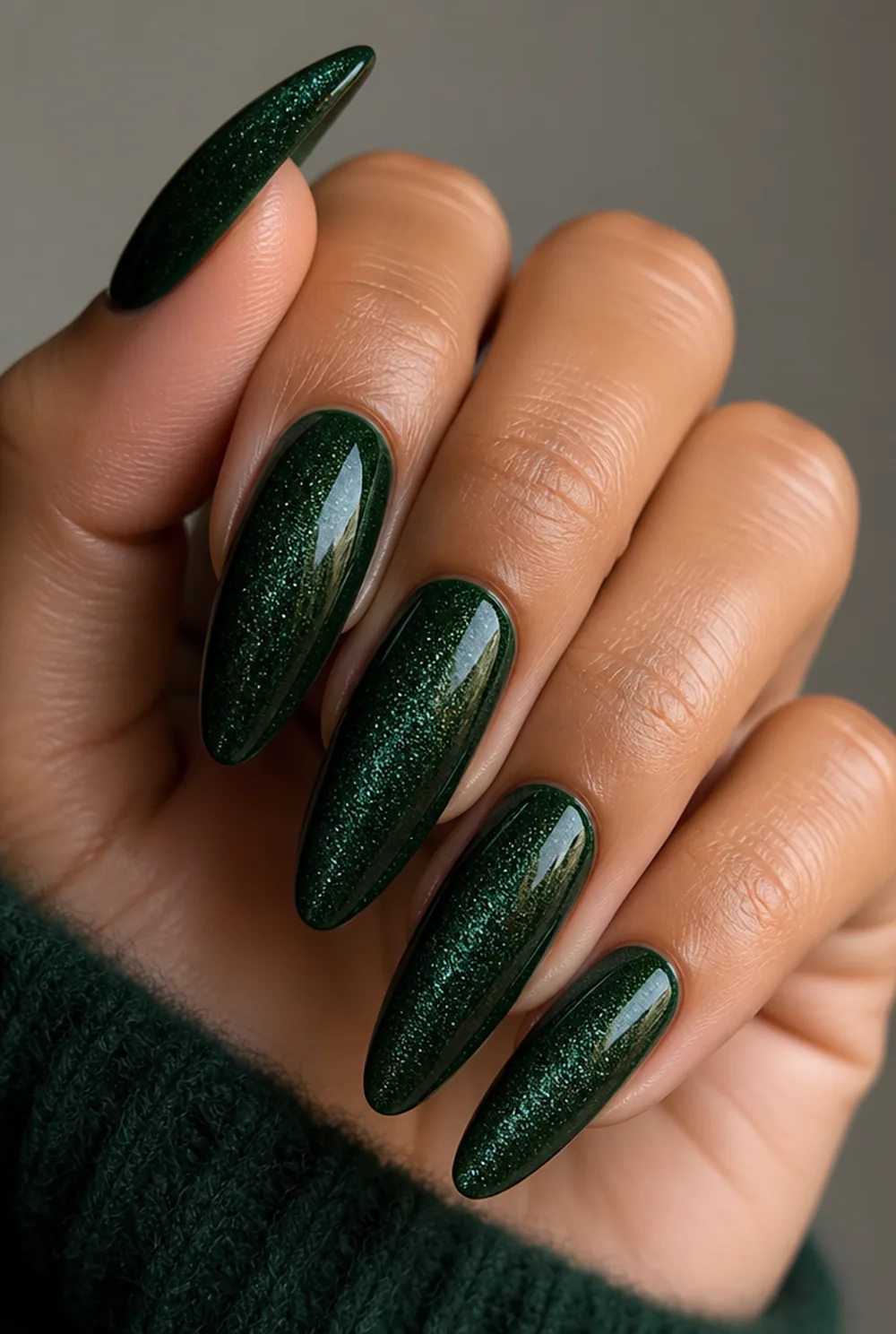 forest green velvet nail art on olive skin, long length