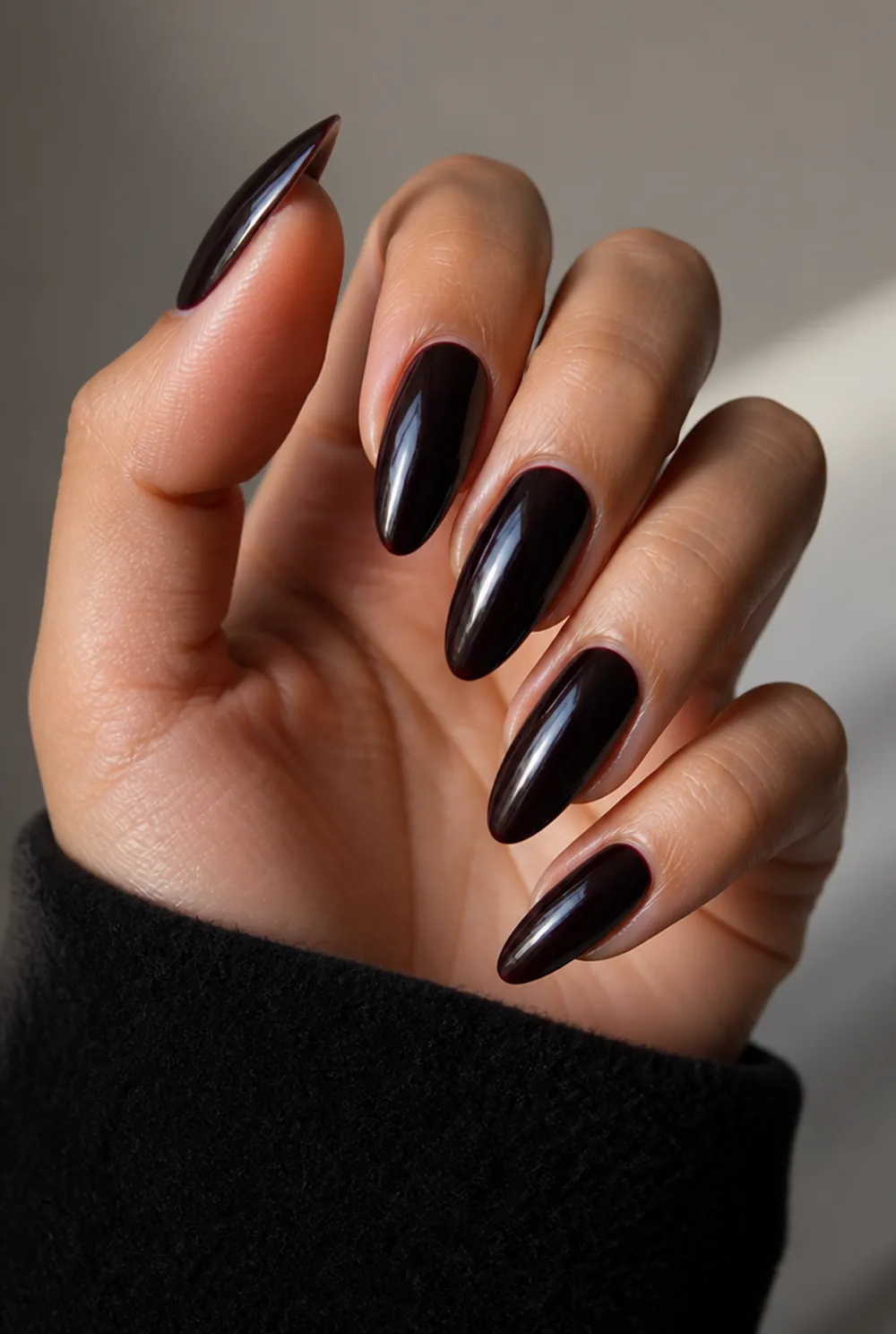 black cherry gloss nail art on olive skin, long length