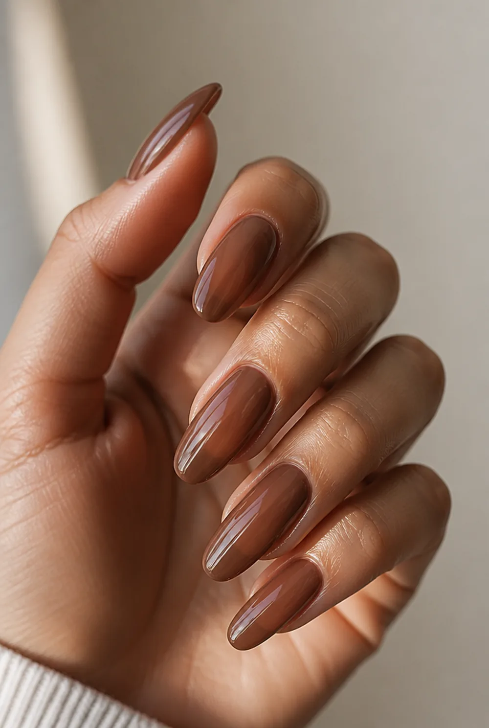 sheer espresso nail art on olive skin, long length