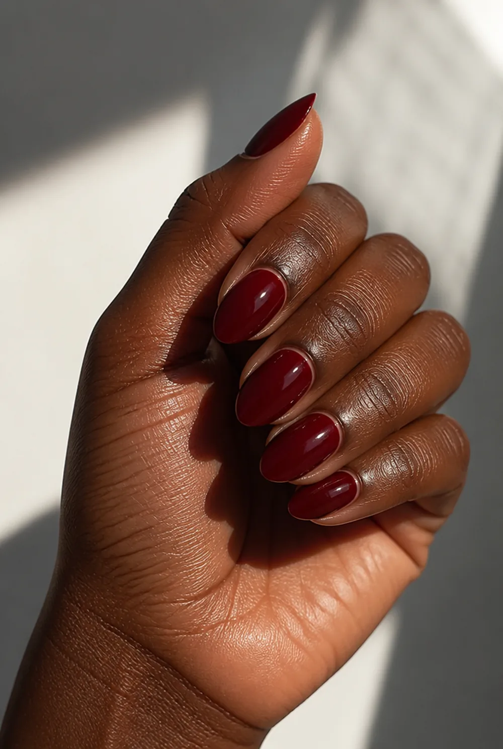 vampire red stiletto nail art on deep brown skin - PolishedAndPrettyNails.com vampire red stiletto nail art on deep brown skin