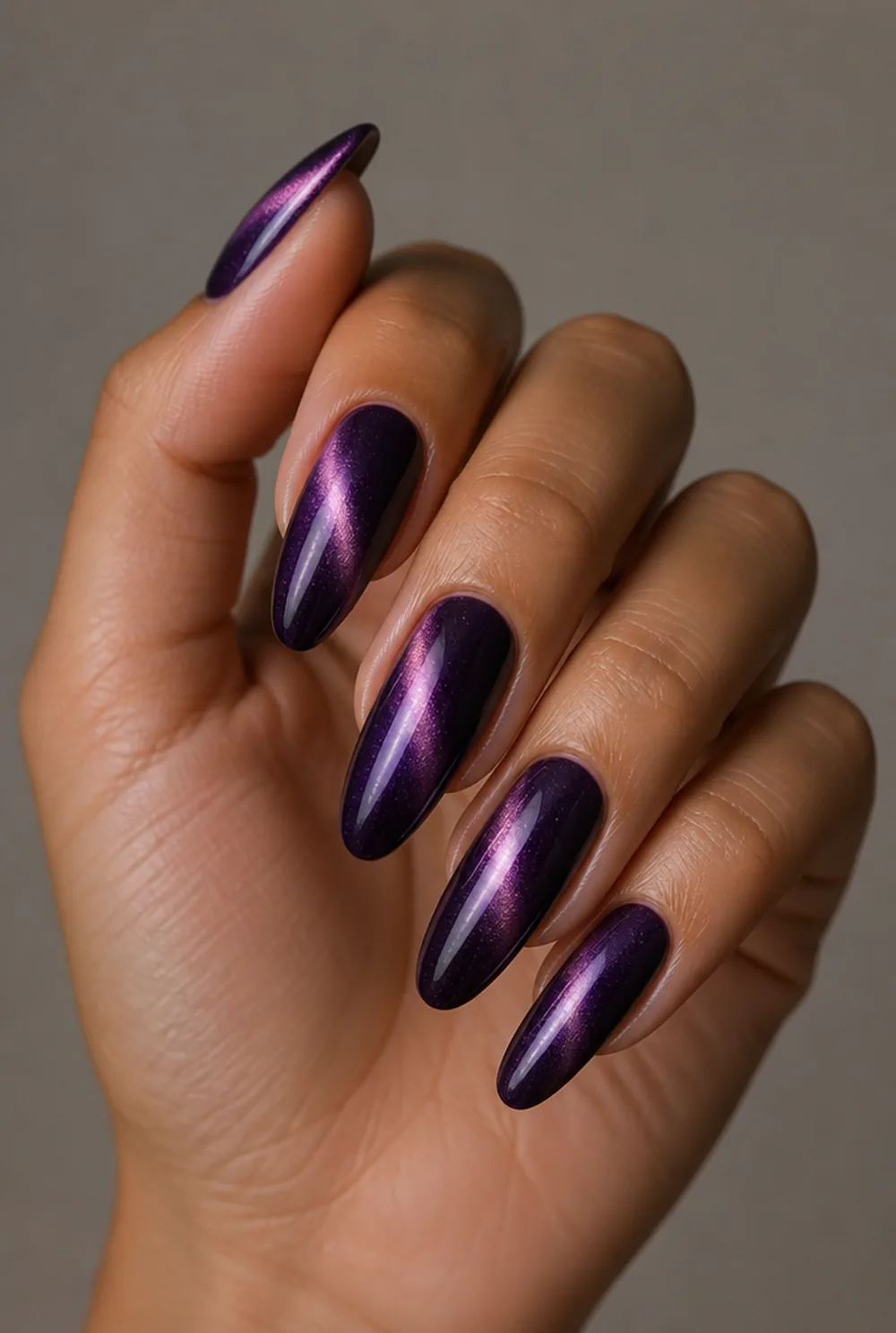 witchy purple cat eye nail art on olive skin long length - PolishedAndPrettyNails.com witchy purple cat eye nail art on olive skin, long length