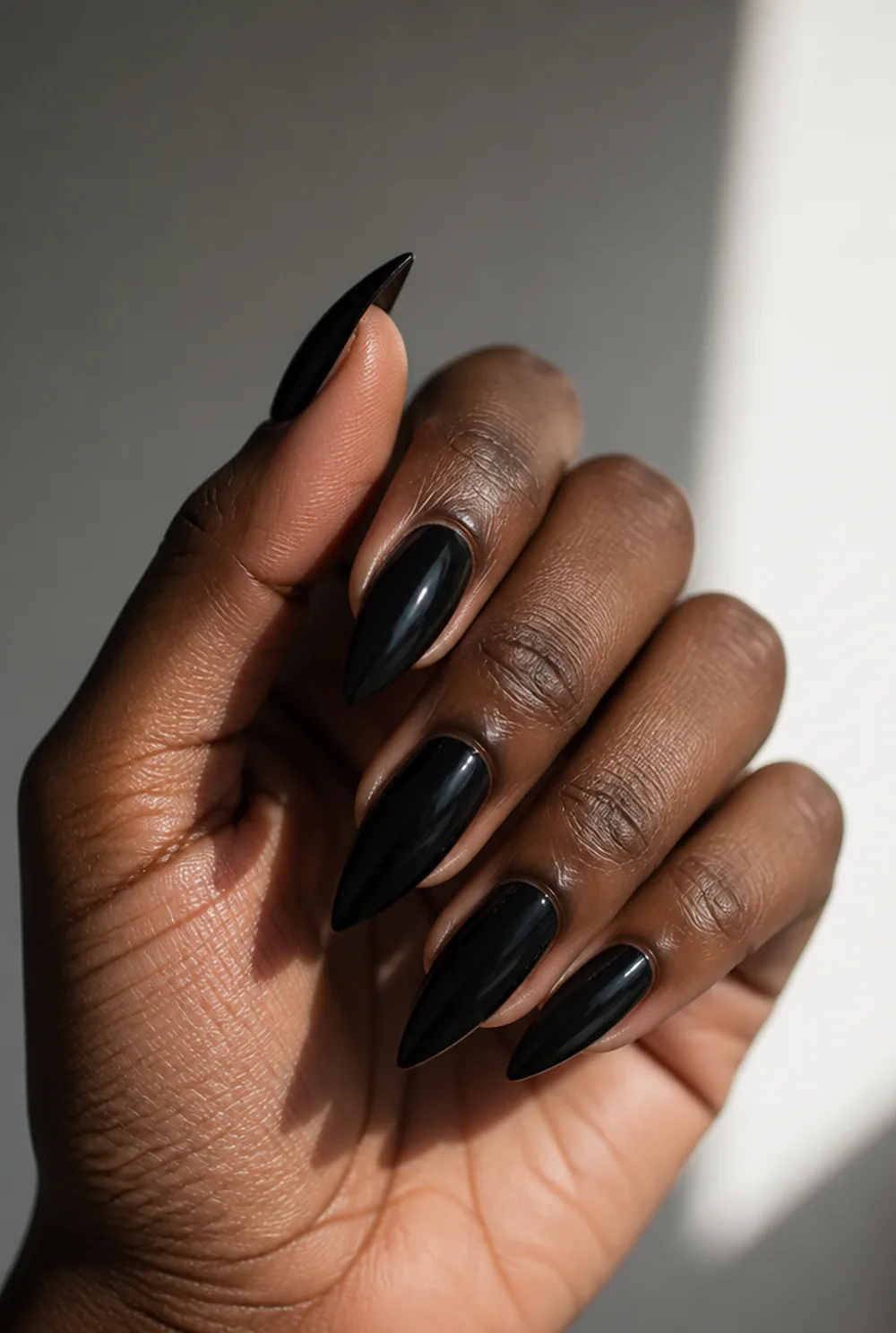 black stiletto nail art on deep brown skin - PolishedAndPrettyNails.com black stiletto nail art on deep brown skin