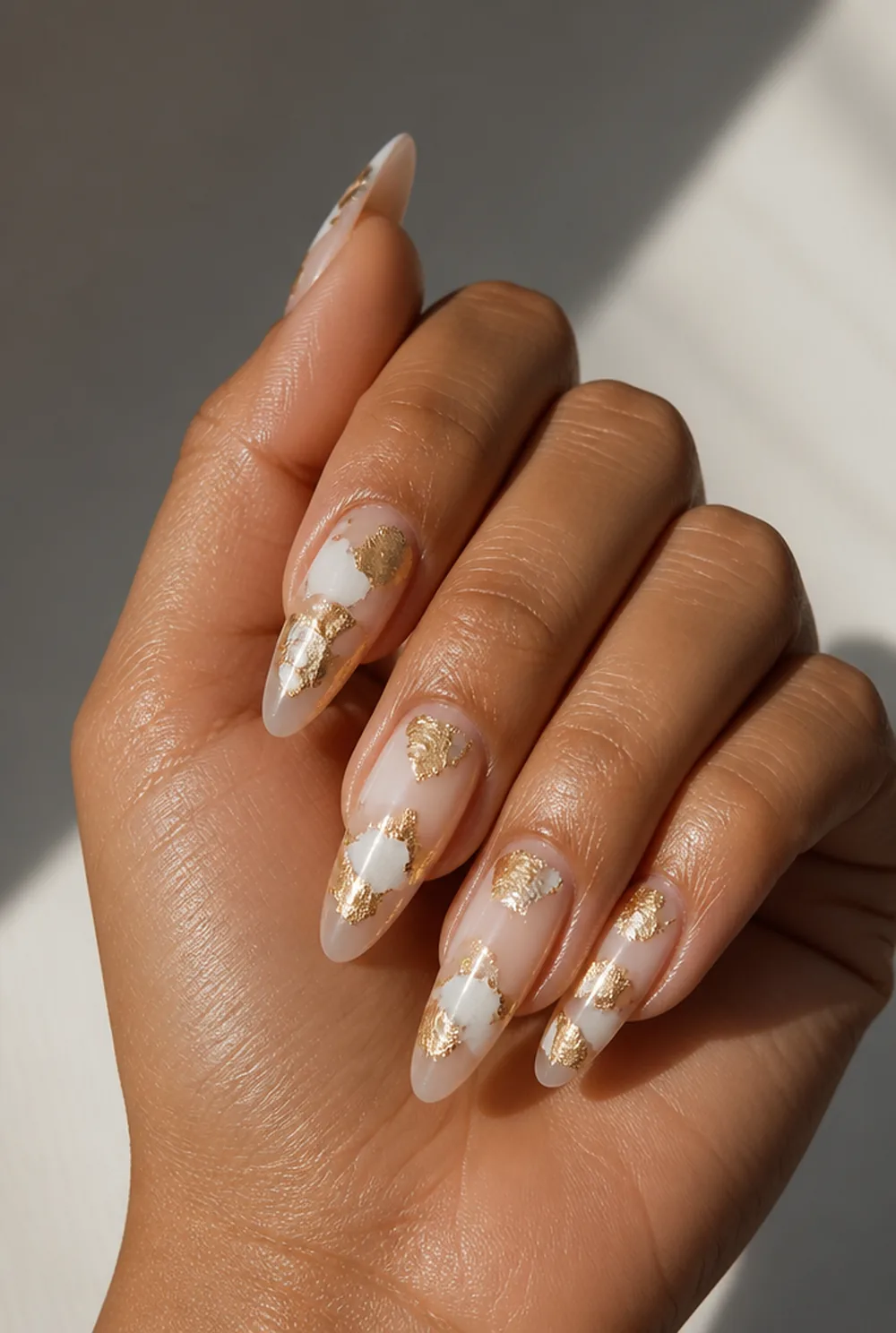 gold foil flakes nail art on olive skin long length - PolishedAndPrettyNails.com gold foil flakes nail art on olive skin, long length