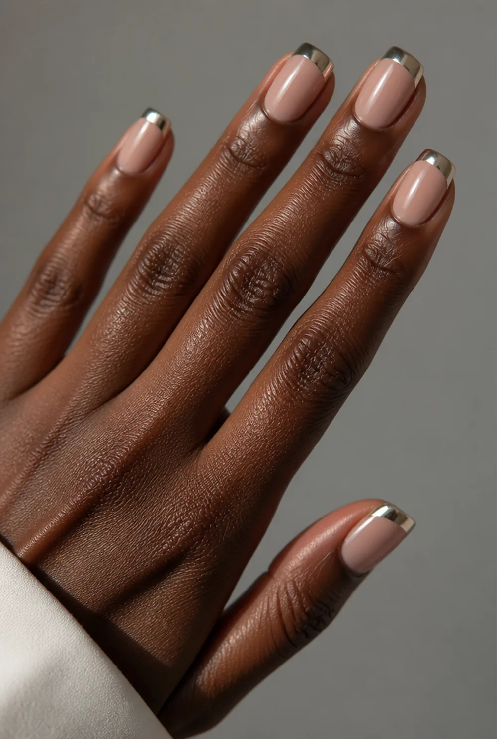 chrome french nail art on deep brown skin - PolishedAndPrettyNails.com chrome french nail art on deep brown skin