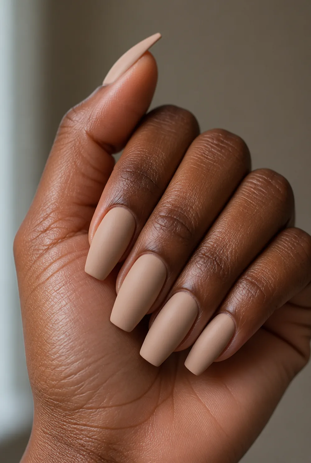 matte nude coffin nail art on deep brown skin - PolishedAndPrettyNails.com matte nude coffin nail art on deep brown skin