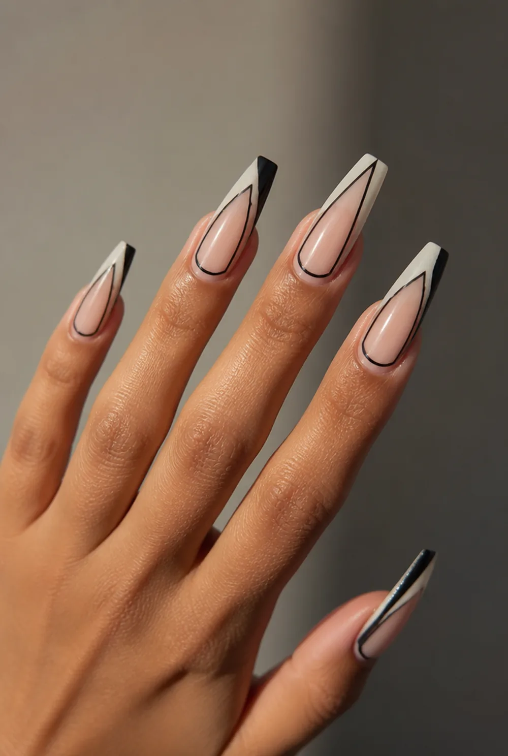 negative-space geometry nail art on olive skin long length - PolishedAndPrettyNails.com negative-space geometry nail art on olive skin, long length