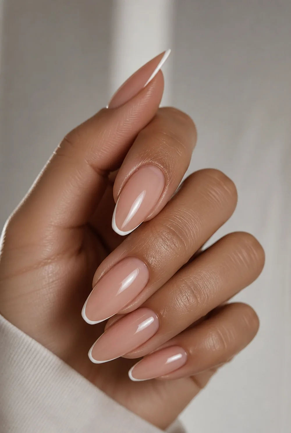 micro french nail art on olive skin, long length