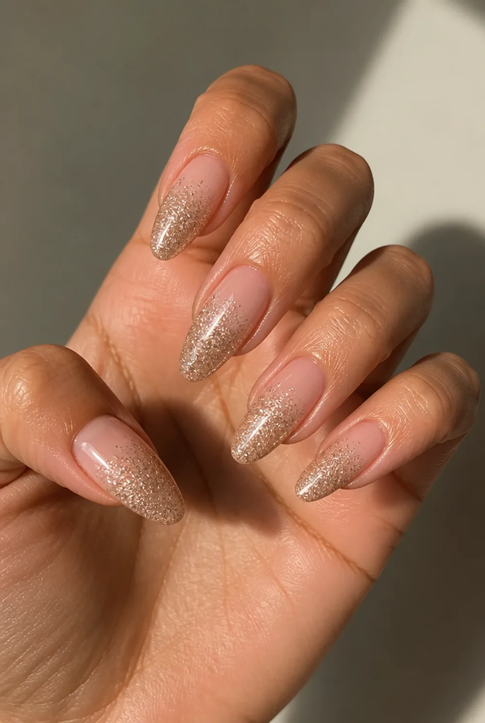 cuticle glitter fade nail art on olive skin, long length